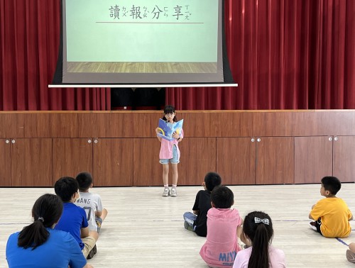 讀報教育-朝會朗讀報紙.JPG